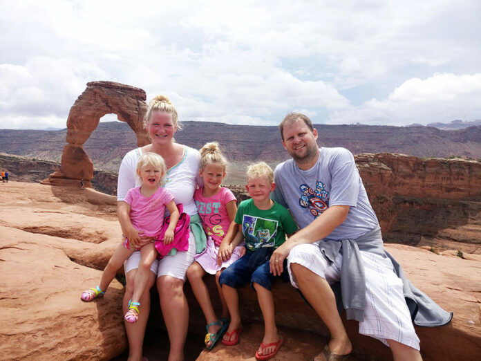 Delicate Arch, touring Arches National Park, Arches National Park, Utah, Delicate Arch, Diapersonaplane, Diapers On A Plane, Traveling with Kids, Family Travel,